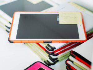 Stack of iPads in a classroom