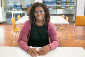 Smiling teacher in a classroom