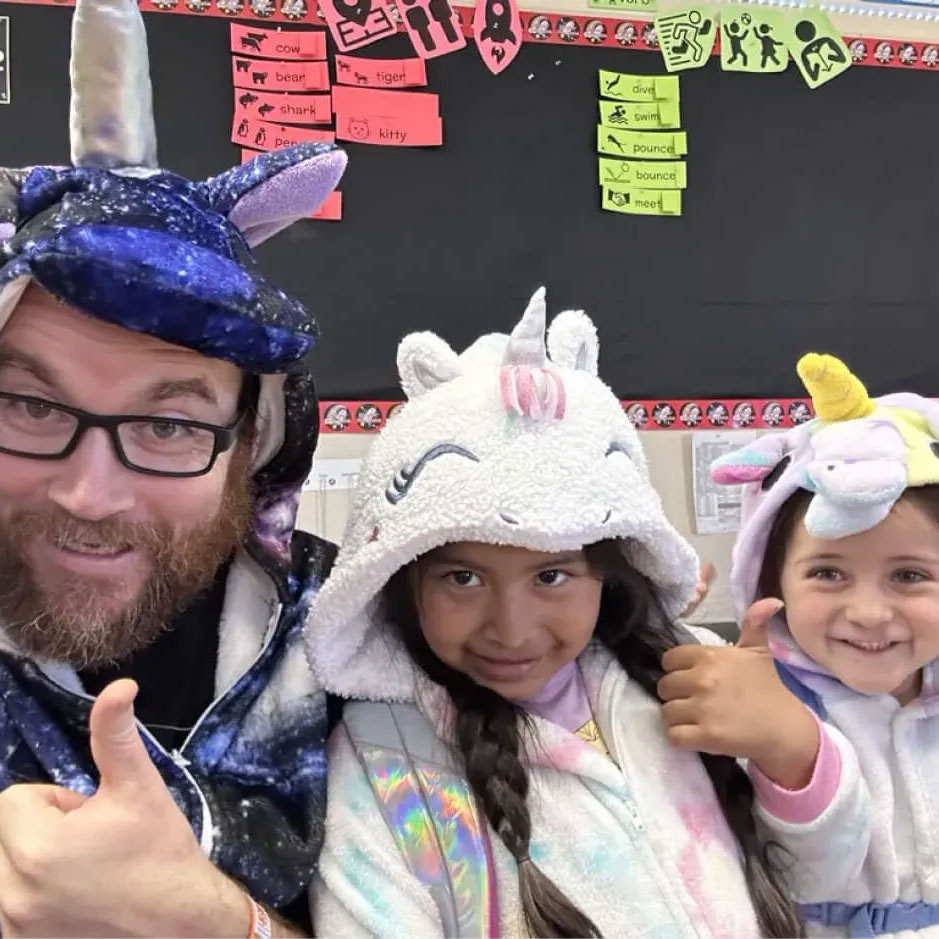 teacher and students dressed up in costumes