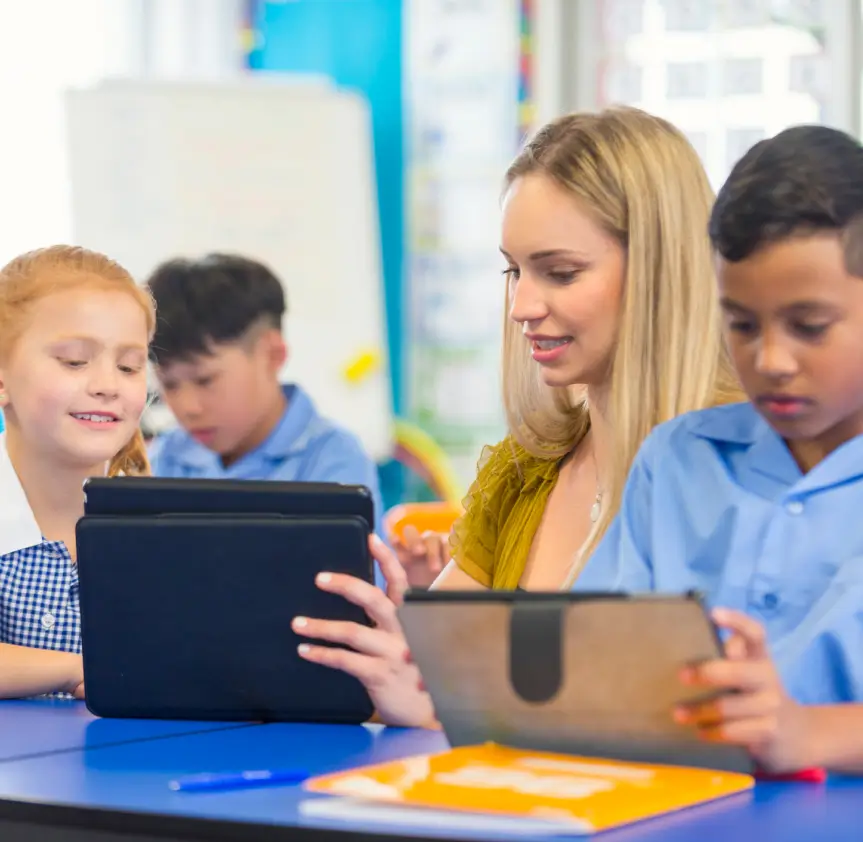 Teacher helping a student in class